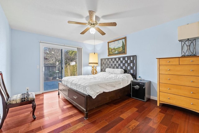 bedroom with access to exterior, dark hardwood / wood-style floors, and ceiling fan