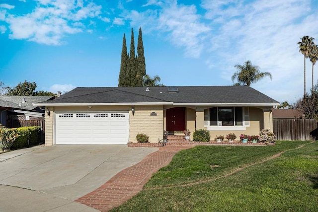 ranch-style house featuring a garage and a front yard