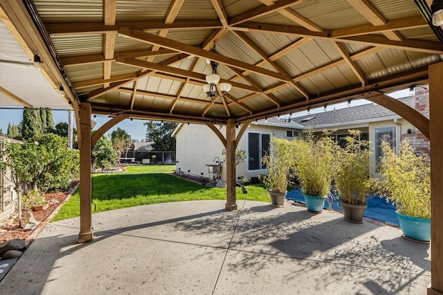 view of patio / terrace featuring a gazebo and ceiling fan