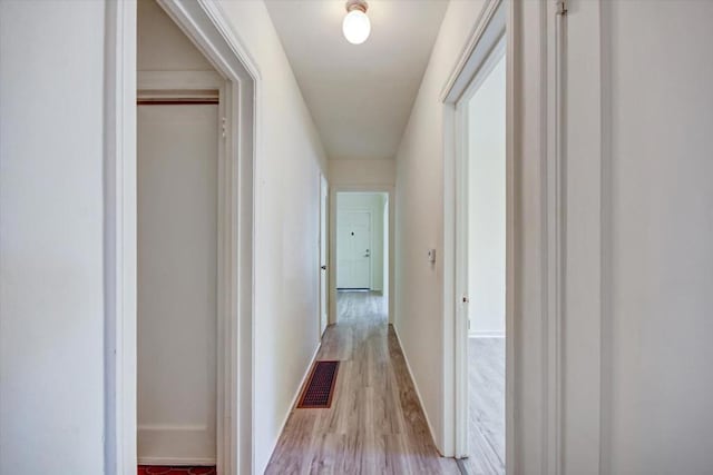 hallway featuring light wood-type flooring