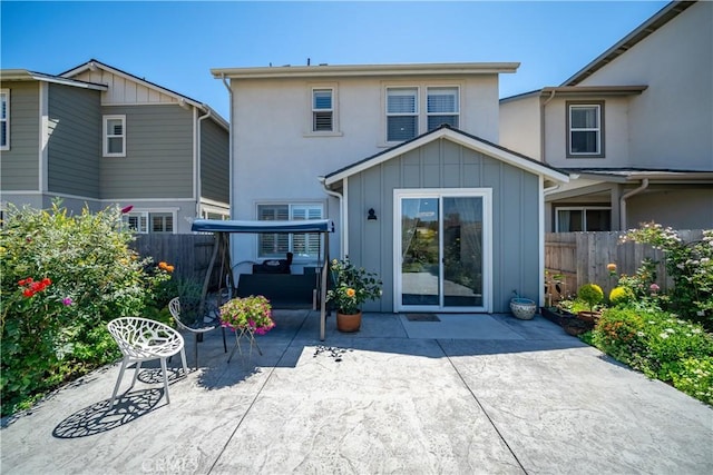 rear view of house featuring a patio