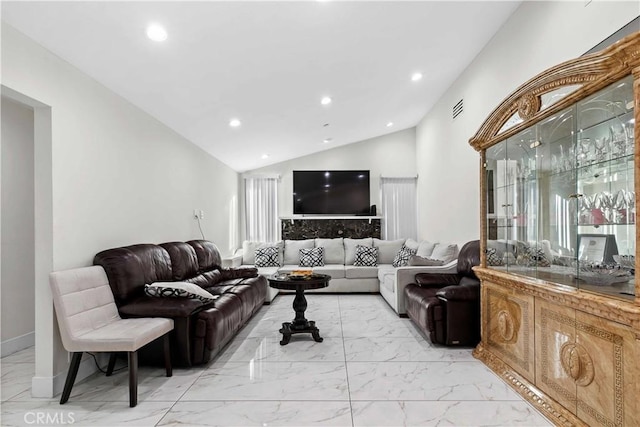 living room with vaulted ceiling