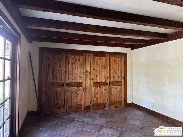 interior space with beamed ceiling