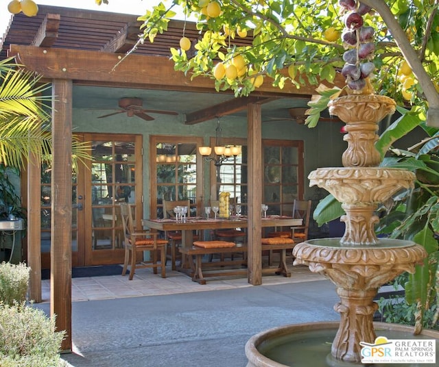 view of patio with ceiling fan and french doors