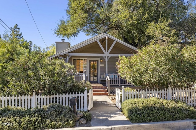 bungalow-style home featuring a porch