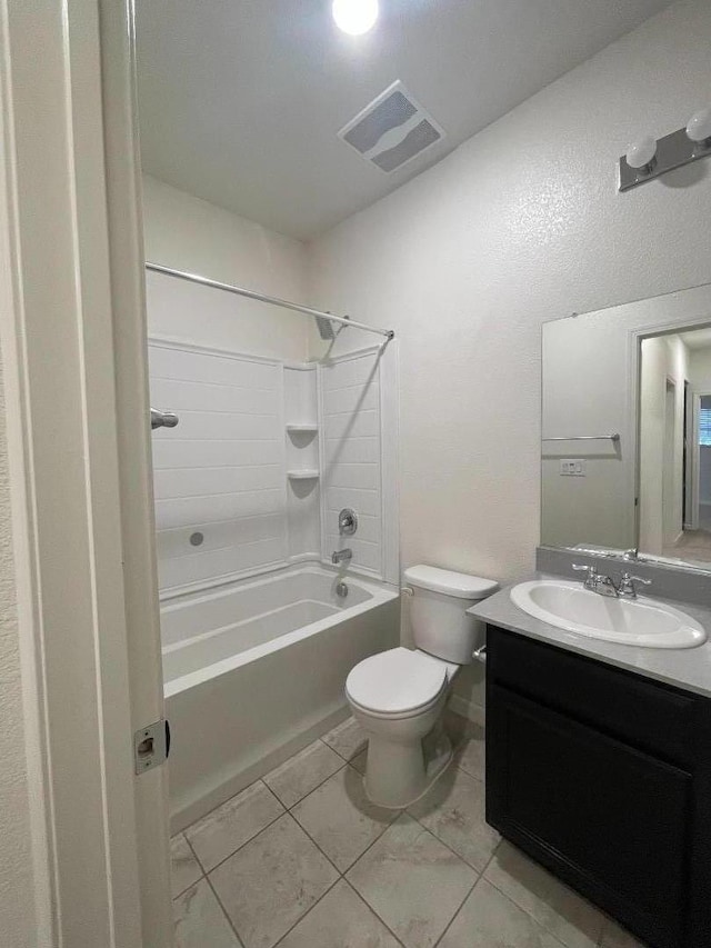 full bathroom with toilet, vanity, tile patterned floors, and washtub / shower combination