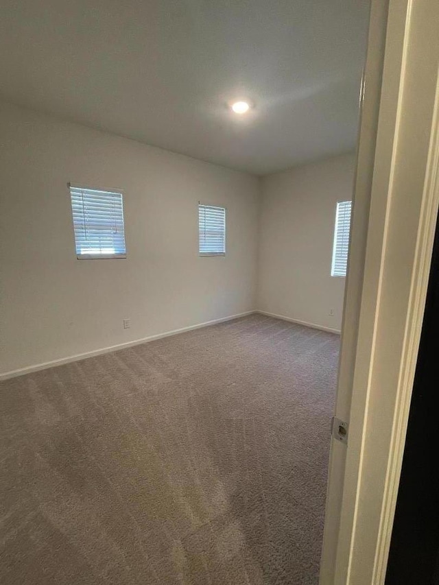 empty room with carpet floors