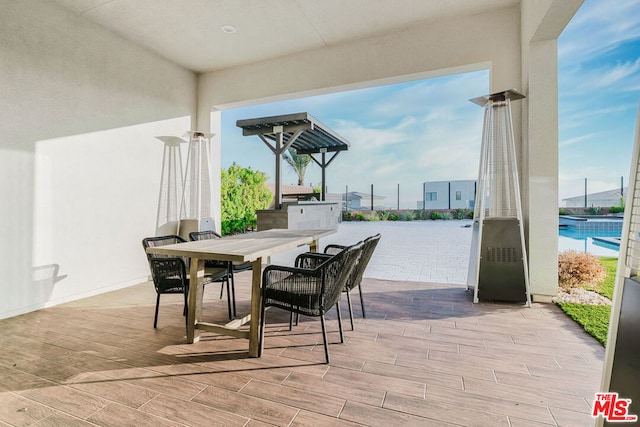 view of patio / terrace with a water view