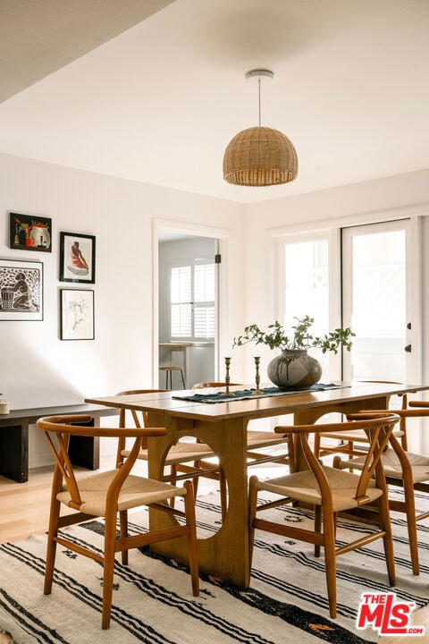 dining space featuring hardwood / wood-style floors