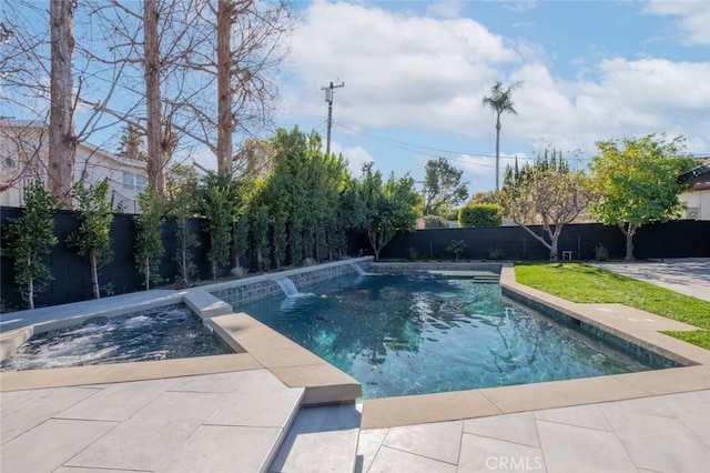 view of swimming pool with pool water feature