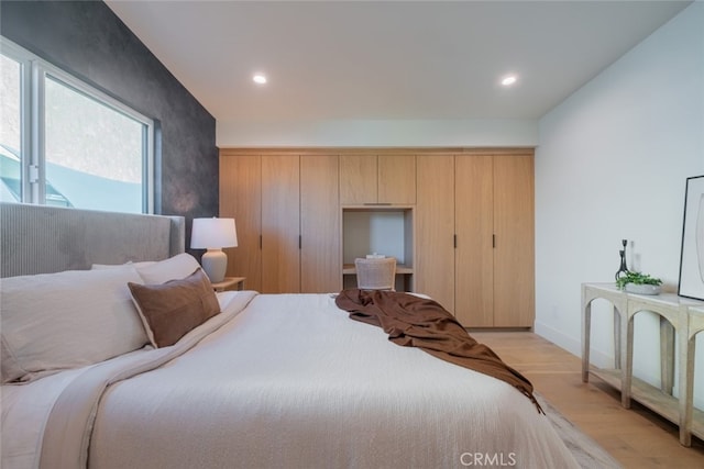 bedroom featuring light hardwood / wood-style flooring