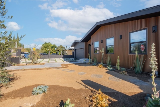 exterior space with a garage