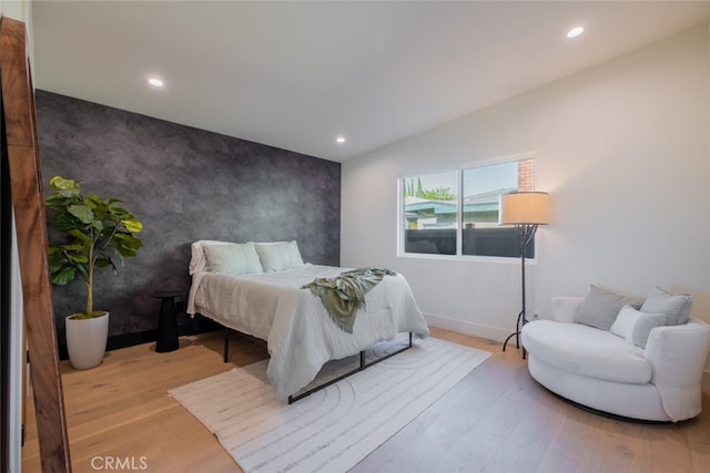 bedroom featuring light wood-type flooring