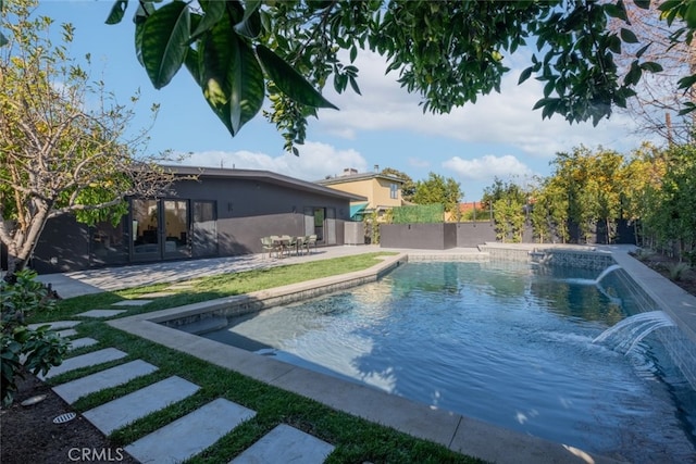 view of pool featuring a patio area and pool water feature