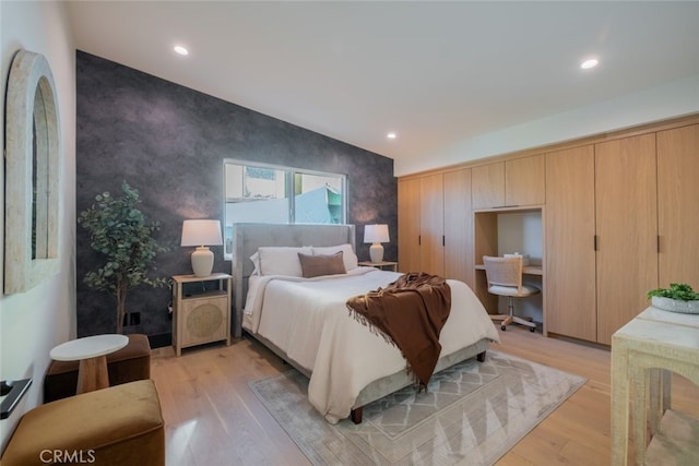 bedroom featuring light wood-type flooring