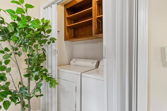 washroom featuring independent washer and dryer