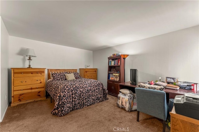 bedroom featuring light colored carpet