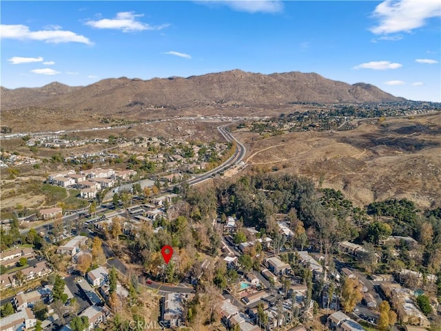 drone / aerial view featuring a mountain view