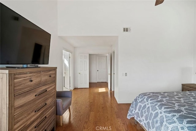 bedroom featuring wood-type flooring