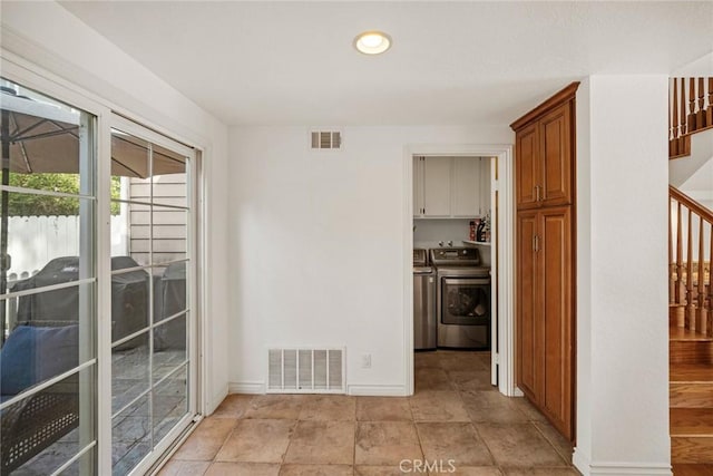 interior space with separate washer and dryer