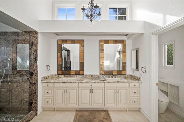 bathroom featuring tile patterned flooring, a shower with shower door, and a high ceiling