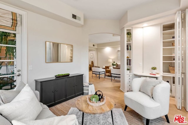 living room with light hardwood / wood-style floors