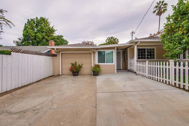 ranch-style home with a garage