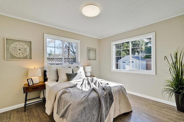 bedroom featuring dark hardwood / wood-style floors