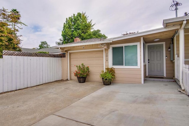 exterior space with a garage