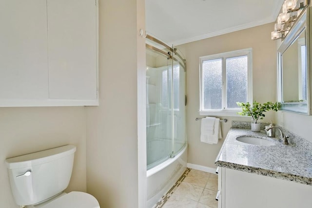 full bathroom featuring toilet, ornamental molding, vanity, and bath / shower combo with glass door