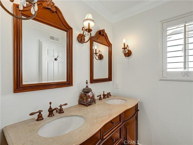 bathroom featuring vanity and ornamental molding