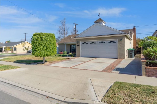 single story home with a garage