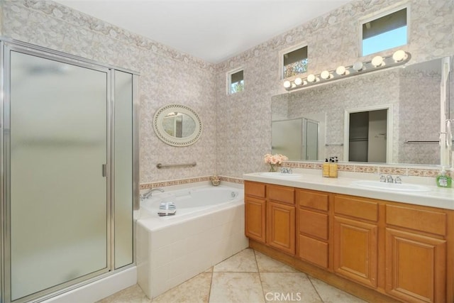 bathroom with tile patterned flooring, plus walk in shower, and vanity