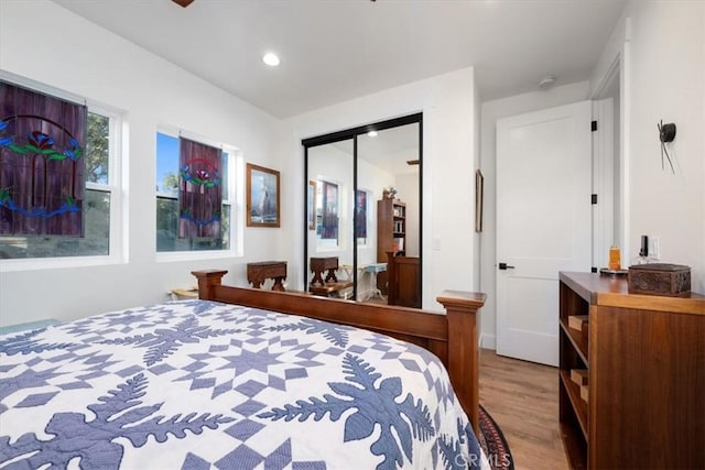 bedroom with light hardwood / wood-style floors