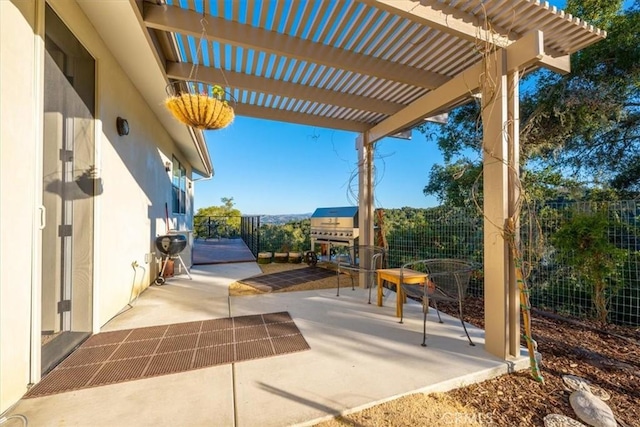 view of patio featuring a pergola