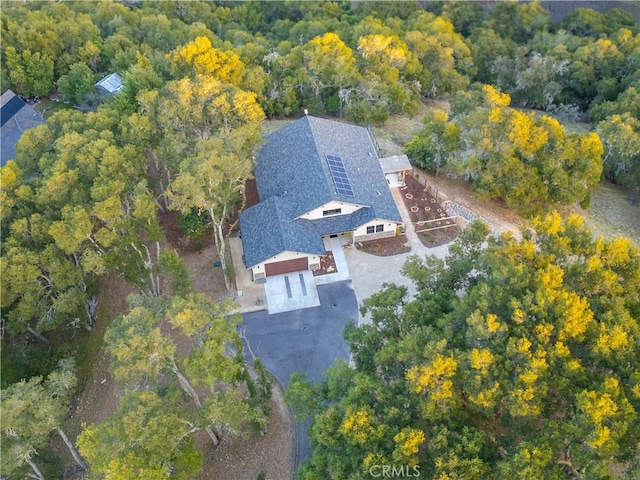 drone / aerial view with a forest view