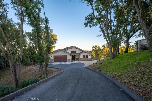 view of front of home with a garage