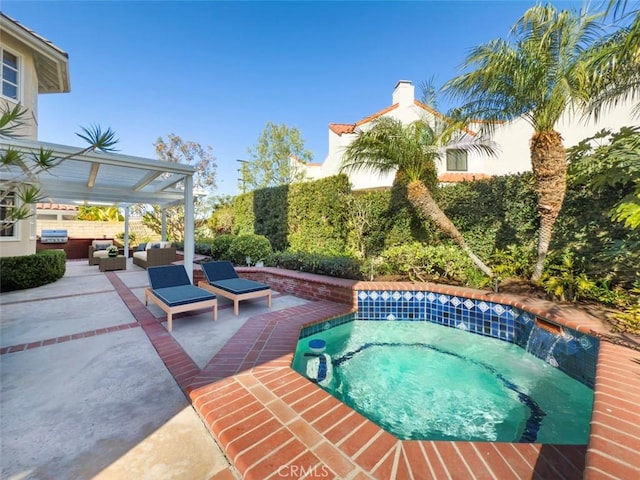 view of pool with a patio, an in ground hot tub, and an outdoor hangout area