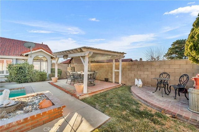 view of yard featuring a patio area and a swimming pool side deck