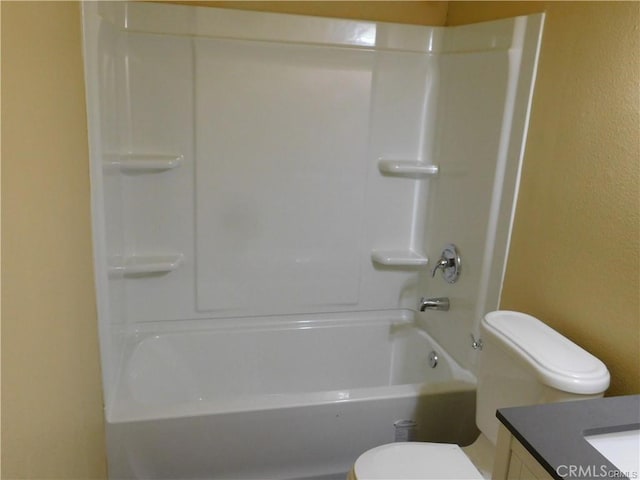 full bathroom with toilet, vanity, and bathtub / shower combination