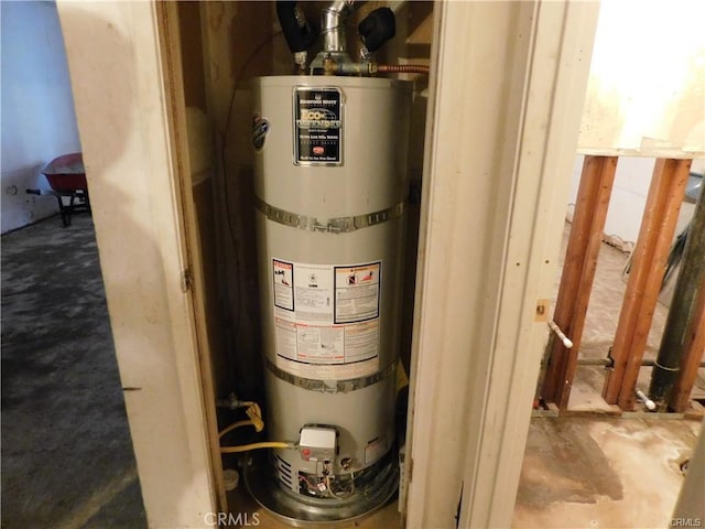 utility room featuring secured water heater