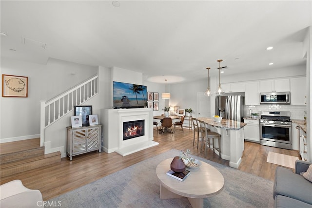 living room with light wood-type flooring