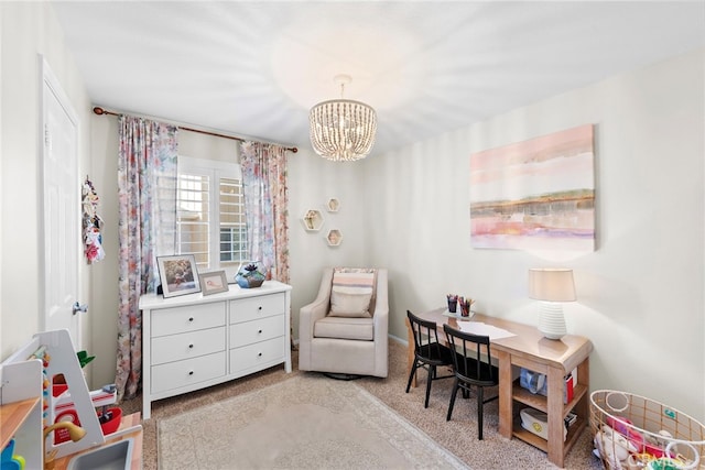 office space with light colored carpet and a notable chandelier