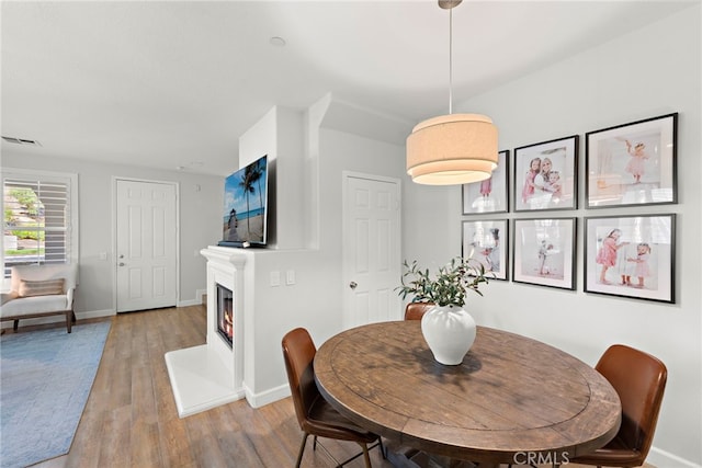 dining area featuring light hardwood / wood-style flooring