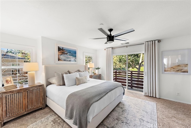 bedroom with ceiling fan, light colored carpet, and access to outside