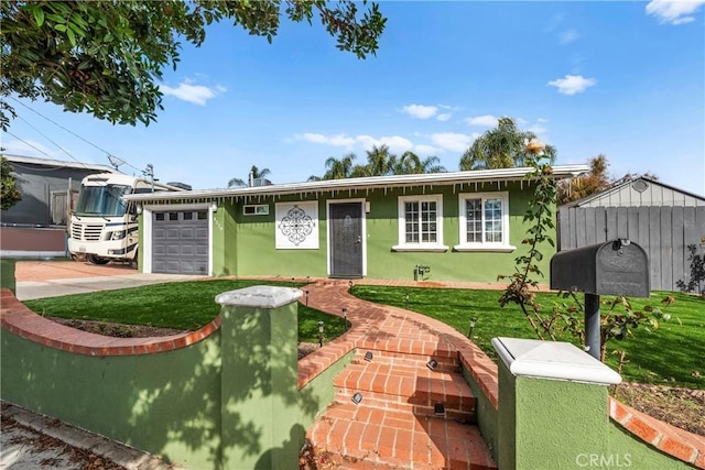 single story home with a front yard and a garage