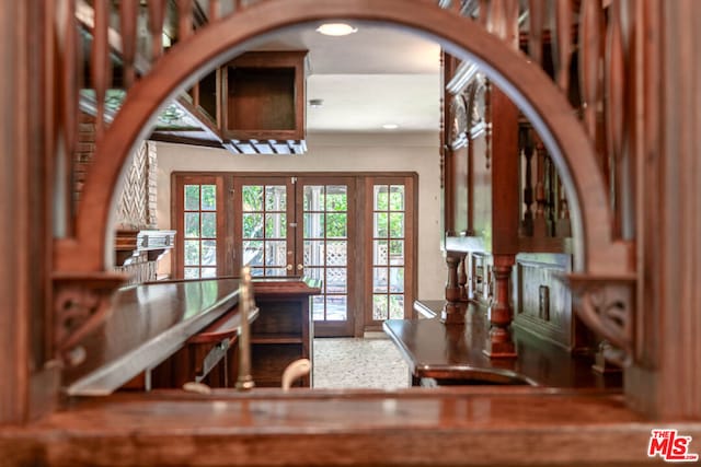 entrance foyer featuring french doors