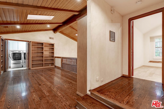 bonus room with vaulted ceiling with skylight, wood ceiling, washer and clothes dryer, and hardwood / wood-style flooring