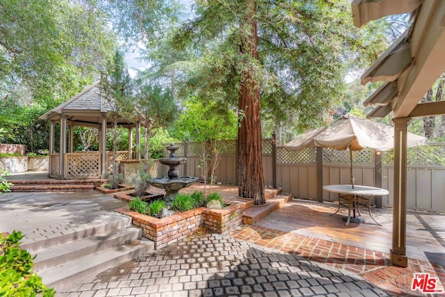 view of patio featuring a gazebo