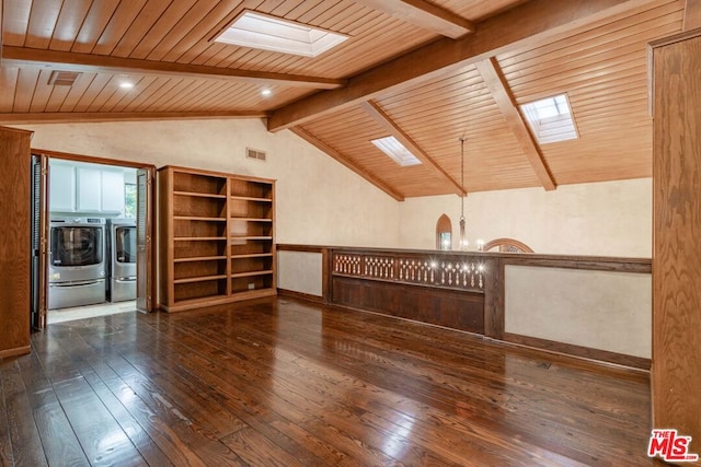 unfurnished room featuring washer and dryer, wood ceiling, dark wood-type flooring, a chandelier, and lofted ceiling with skylight